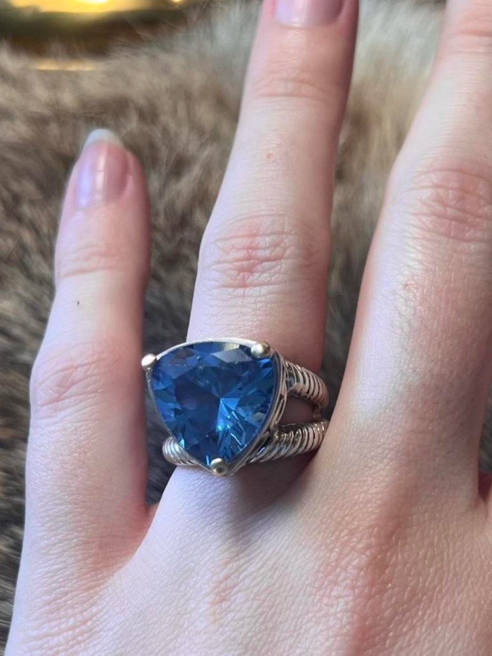 Sterling silver and 18k yellow gold David Schorr blue topaz rope ring